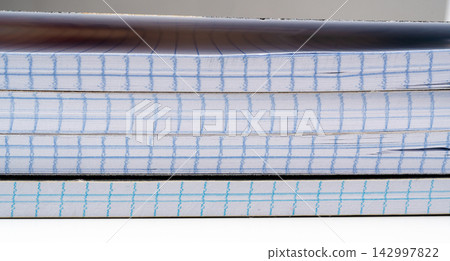 School notebooks stack texture, paper note book on table 142997822