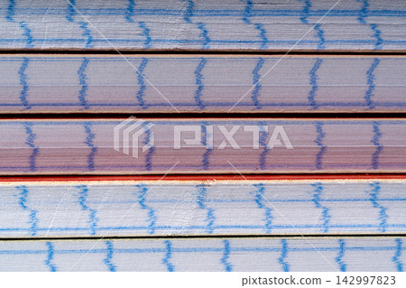 School notebooks stack texture, paper note book on table School notebooks stack texture, paper note book on table 142997823