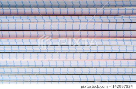 School notebooks stack texture, paper note book on table School notebooks stack texture, paper note book on table 142997824