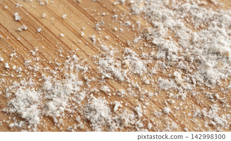 Wheat flour powder textured background, spelt grain dust pattern Wheat flour powder textured background, spelt grain dust pattern 142998300