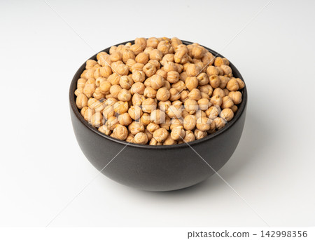 Chickpea, chick pea pile, dry Cicer arietinum fruits, raw Bengal gram legume, garbanzo beans Chickpea, chick pea pile, dry Cicer arietinum fruits, raw Bengal gram legume, garbanzo beans 142998356