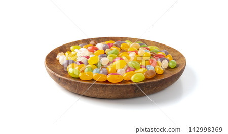 Jelly beans gummy candy pile, colorful marmalade pills Jelly beans gummy candy pile, colorful marmalade pills 142998369