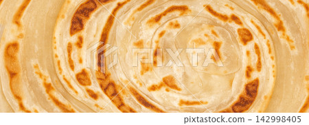 Kerala porotta known as paratha or parotta Kerala porotta known as paratha or parotta 142998405