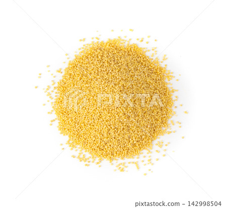 Raw millet grains pile isolated. Little yellow cereal, natural foxtail small seeds Raw millet grains pile isolated. Little yellow cereal, natural foxtail small seeds 142998504