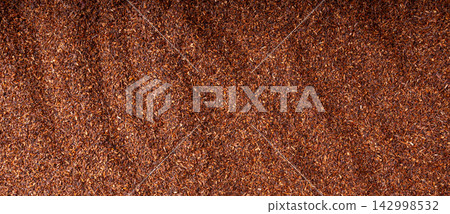 Rooibos tea leaves pattern closeup Rooibos tea leaves pattern closeup 142998532
