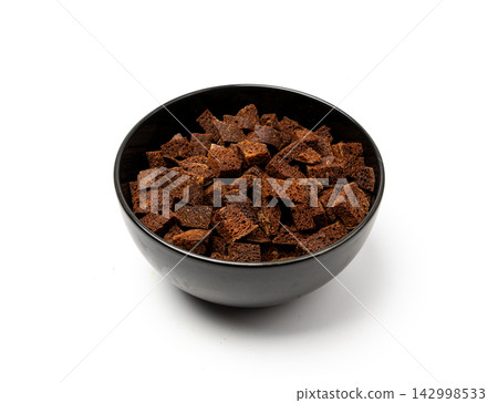 Rye Croutons Isolated, Homemade Brown Bread Rusks Rye Croutons Isolated, Homemade Brown Bread Rusks 142998533