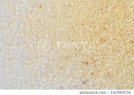 Wheat semolina flour textured background Wheat semolina flour textured background 142998536