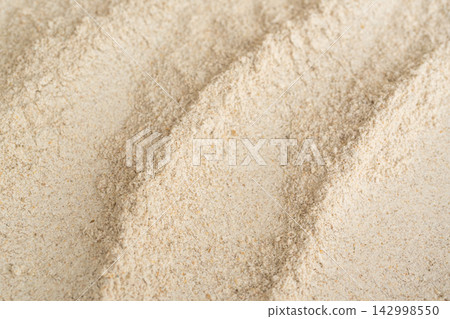 Wheat flour powder textured background, spelt grain dust pattern Wheat flour powder textured background, spelt grain dust pattern 142998550