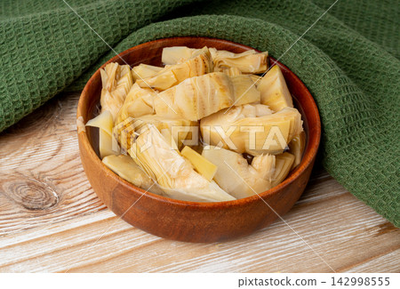 Marinated artichoke cuts, pickled edible cynara flower bud hearts 142998555