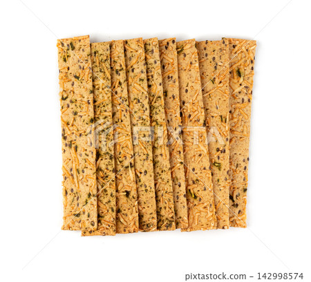Crunchy gluten free crispbread with various seeds top view Crunchy gluten free crispbread with various seeds top view 142998574