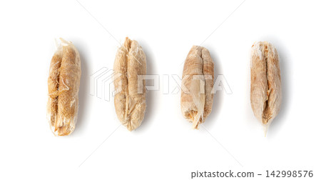Isolated date seeds and date stones with macro texture Isolated date seeds and date stones with macro texture 142998576