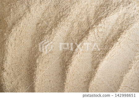 Wheat flour powder textured background, spelt grain dust pattern Wheat flour powder textured background, spelt grain dust pattern 142998651