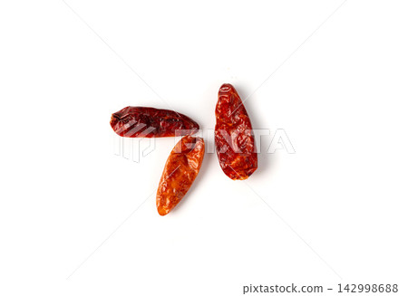 Dry chili pepper isolated, red chilly spice Dry chili pepper isolated, red chilly spice 142998688