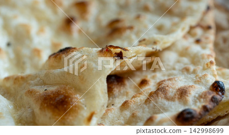 Indian Flat Bread Closeup. Traditional Flatbread Indian Flat Bread Closeup. Traditional Flatbread 142998699
