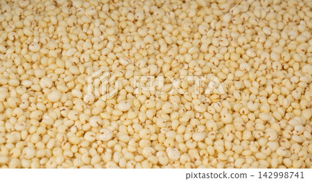 Puffed millet textured background Puffed millet textured background 142998741
