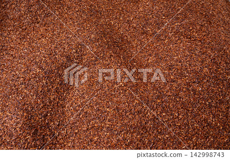 Rooibos tea leaves pattern closeup Rooibos tea leaves pattern closeup 142998743