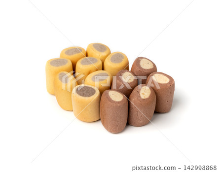 Filled dog biscuits, crackers isolated, soft crunchy pet treats pile, flavored small canine cookie Filled dog biscuits, crackers isolated, soft crunchy pet treats pile, flavored small canine cookie 142998868