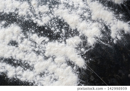 Wheat flour powder textured background, spelt grain dust pattern Wheat flour powder textured background, spelt grain dust pattern 142998939