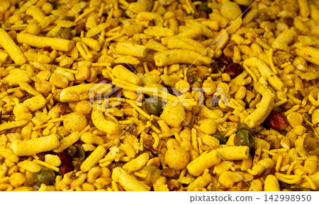 Khatta meetha namkeen textured background Khatta meetha namkeen textured background 142998950