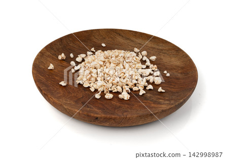 Puffed buckwheat isolated, crispy cereal breakfast, ancient healthy food Puffed buckwheat isolated, crispy cereal breakfast, ancient healthy food 142998987