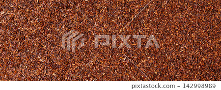 Rooibos tea leaves pattern closeup Rooibos tea leaves pattern closeup 142998989