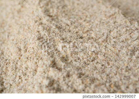 Wheat flour powder textured background, spelt grain dust pattern Wheat flour powder textured background, spelt grain dust pattern 142999007