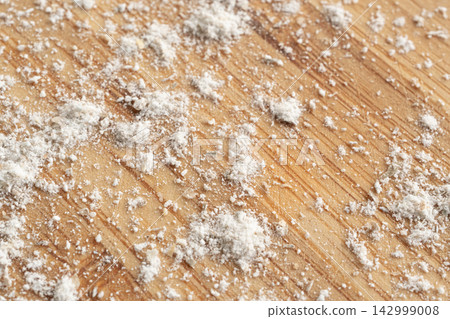 Wheat flour powder textured background, spelt grain dust pattern 142999008