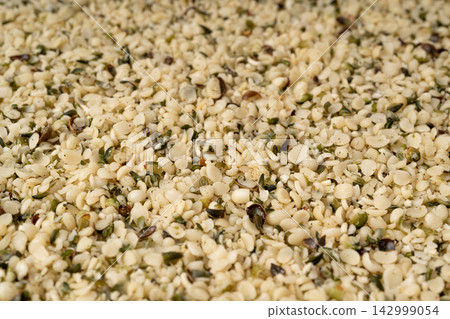 Shelled hemp seeds texture background Shelled hemp seeds texture background 142999054