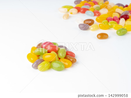 Jelly beans gummy candy pile, colorful marmalade pills Jelly beans gummy candy pile, colorful marmalade pills 142999058