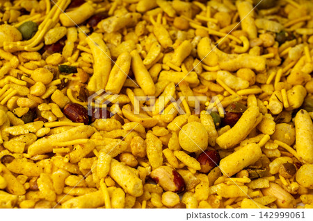 Khatta meetha namkeen textured background Khatta meetha namkeen textured background 142999061