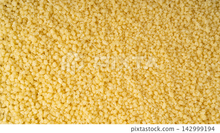 Couscous texture background close up Couscous texture background close up 142999194