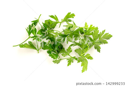 Fresh parsley leaf with water drops isolated Fresh parsley leaf with water drops isolated 142999233