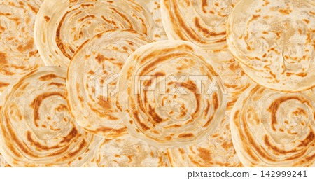 Kerala porotta known as paratha or parotta Kerala porotta known as paratha or parotta 142999241
