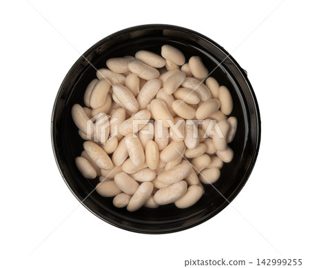 Soaked white beans, legume seeds in water 142999255
