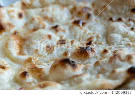 Indian Flat Bread Closeup. Traditional Flatbread Indian Flat Bread Closeup. Traditional Flatbread 142999352
