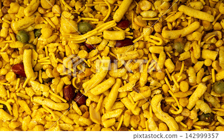 Khatta meetha namkeen textured background Khatta meetha namkeen textured background 142999357