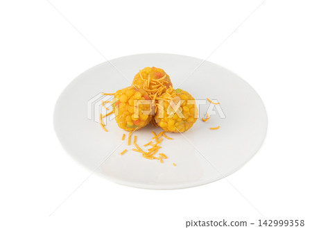 Ladoo, laddu or bundi laddoo is Indian sweet Diwali food. This is boondi ladoo balls Ladoo, laddu or bundi laddoo is Indian sweet Diwali food. This is boondi ladoo balls 142999358