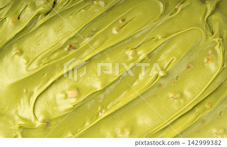 Pistachio cream pattern, dubai green chocolate textured background 142999382