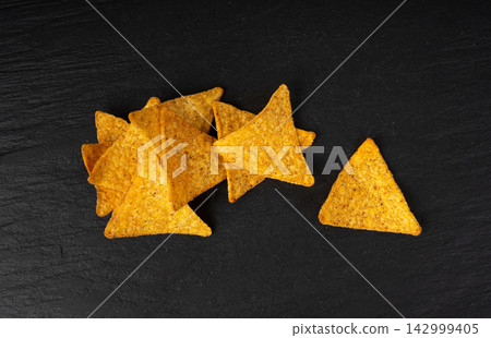 Tortilla chips, mexican nacho snack Tortilla chips, mexican nacho snack 142999405