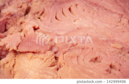 Canned Tuna Close Up, Albacore Fish Chunks in Open Tin Can Canned Tuna Close Up, Albacore Fish Chunks in Open Tin Can 142999406