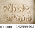 Wheat flour powder textured background, spelt grain dust pattern 142999408