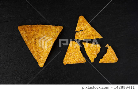 Tortilla chips, mexican nacho snack Tortilla chips, mexican nacho snack 142999411