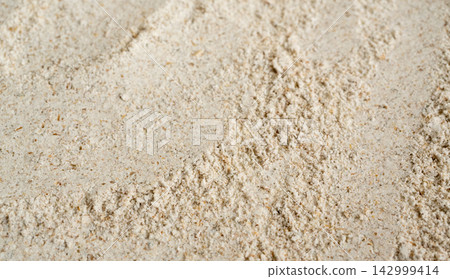 Wheat flour powder textured background, spelt grain dust pattern Wheat flour powder textured background, spelt grain dust pattern 142999414