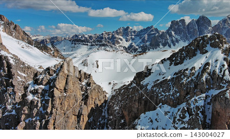 Majestic rocky mountains in snow Alps Dolomites Majestic rocky mountains in snow Alps Dolomites 143004027
