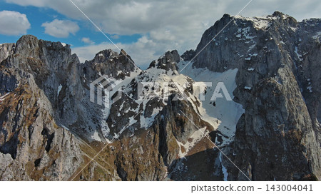 Rocky snow mountains aerial view Rocky snow mountains aerial view 143004041