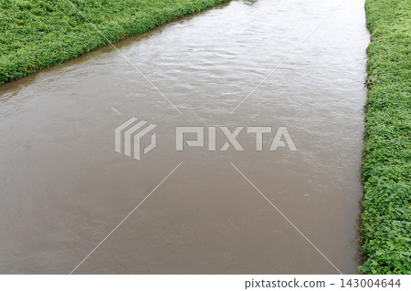 River that was flooded by heavy rain River that was flooded by heavy rain 143004644