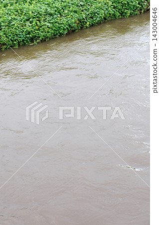 River that was flooded by heavy rain River that was flooded by heavy rain 143004646