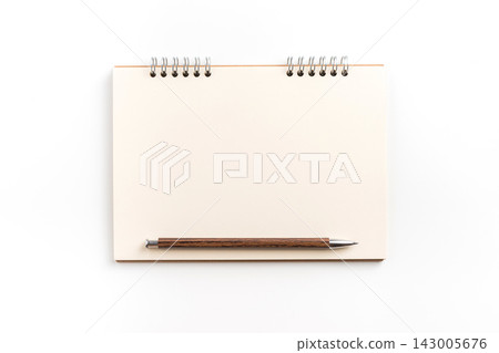Top view of blank spiral notebook mockup on white background 143005676