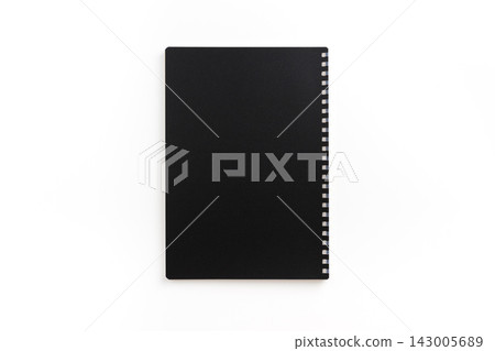 Top view of black spiral notebook cover mockup on white background Top view of black spiral notebook cover mockup on white background 143005689