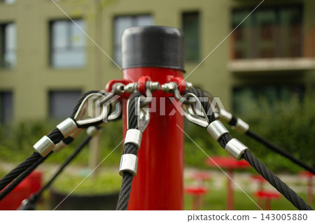 Close up of rope fastener on children playground equipment Close up of rope fastener on children playground equipment 143005880